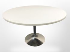 A Swedish Johanson Design circular dining table on chrome pedestal,