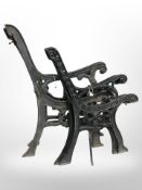 Two pairs of cast iron bench ends