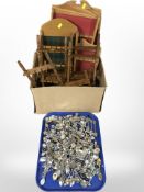 Several spoon racks and a large quantity of collector's spoons.