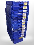 Twelve stackable plastic storage boxes with folding lids,