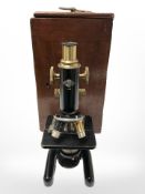 A W R Prior and Co. lacquered brass microscope in mahogany travel case, microscope 30cm high.