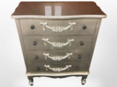 A modern gilt four drawer chest,
