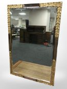 A gilt bevelled rectangular mirror,