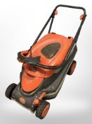 A Flymo electric lawn mower