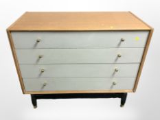 A 20th century G-plan teak four drawer chest designed by E.