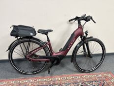 A Raleigh Motus Tour Bosch Active Line electric bike, instruction manual, bike lock with key,
