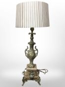 An ornate cast brass and marble table lamp,