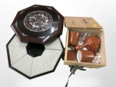 An oriental lacquered octagonal lidded box, and a further pine box containing terracotta tea wares.