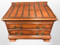 A Mosotti fall fronted low cabinet,