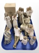 A group of Willow Tree figures.