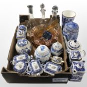 A group of Ringtons blue and white Willow Pattern teapots, lidded jars, vases, etc.