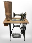 A Singer cast iron treadle sewing machine