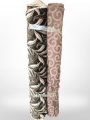 Two rolls of upholsterer's material, width approximately 140 cm, length unknown.