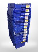 Twelve stackable plastic storage boxes with folding lids,