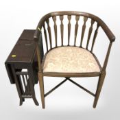 A Victorian mahogany Sutherland table and an armchair