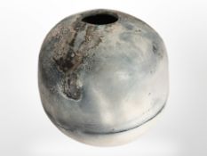 A studio pottery Raku vase, signed to base, height 13cm.