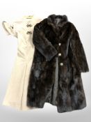 Two lady's brown mink fur coats and a further synthetic coat