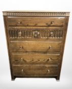 A Fyne Ladye carved oak five drawer chest,