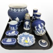 A group of Wedgwood and Tunstall blue and white Jasperware ceramics.