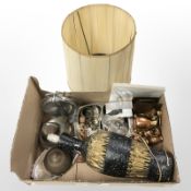 A ceramic lamp base, group of metal wares including miniature copper jugs,