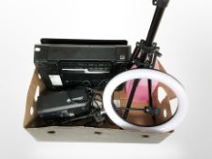A ring light with tripod stand, smoke machine, HP printer, etc.