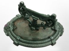 A painted cast iron boot scraper,