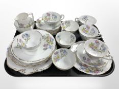 28 pieces of English porcelain tea china hand-painted with flowers.