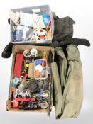A group of fishing reels, spools of line, lures, clothing, etc.