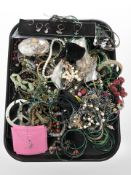 A tray of assorted costume necklaces, bangles, pendants, etc.
