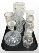 A group of crystal vases, one marked 'Made in Poland', ship's decanter, and two other decanters.