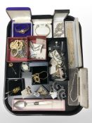 A collection of costume jewellery, charm bracelet, bangles, simulated pearls,