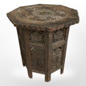 A 19th century Anglo Indian carved hardwood octagonal occasional table,