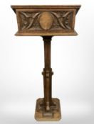 A Victorian carved oak Gothic Revival lectern,