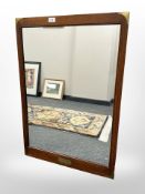 A mahogany and brass-mounted mirror, 89cm by 61cm.