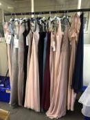 A rail of approximately nineteen lady's evening dresses