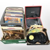 A collection of vinyl LP records and 7-inch singles including The Beach Boys, The Carpenters,