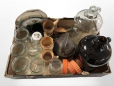 Two glass demijohns, kitchen storage jars, Victorian copper kettle, cruet set, and other ceramics.