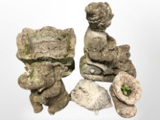 Five various concrete planters and ornaments,