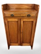 A mahogany double door cabinet,