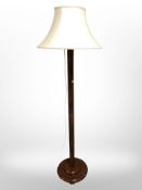 A 20th century Oriental carved hardwood standard lamp