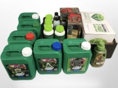 Several bottles of garden plant feed,