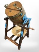 A pine and cast iron Champion churn,