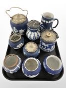 A group of Tunstall blue and white Jasperware ceramics including pots, biscuit barrels,