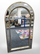 A reproduction gilt sectional domed topped mirror,