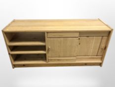 A 20th century pine low sideboard,