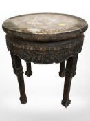 A 19th century Chinese carved hardwood and rouge marble inset plant stand,