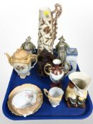 A group of ceramics including Delft vase, Toby jug, pair of oriental bobbing head figures, etc.