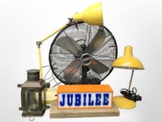 An angle-poise lamp, copper lantern, desk fan,