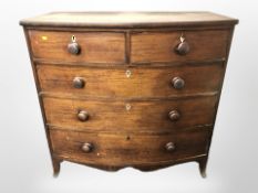 A Victorian mahogany bow fronted five drawer chest,