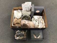 A quantity of costume bridal wear including tiarras, lace work items,